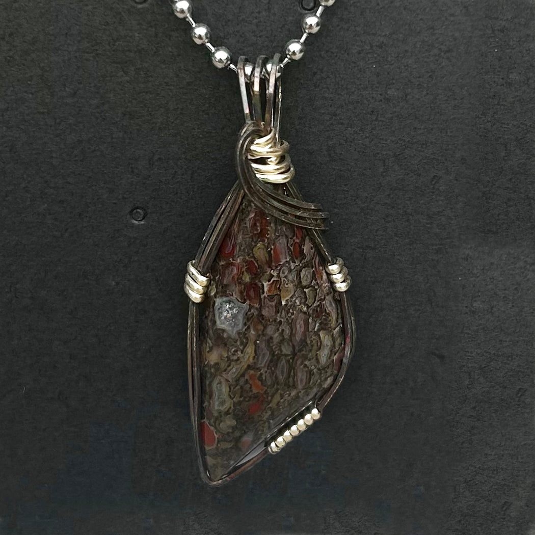 Fossilized Dinosaur Bone Pendant